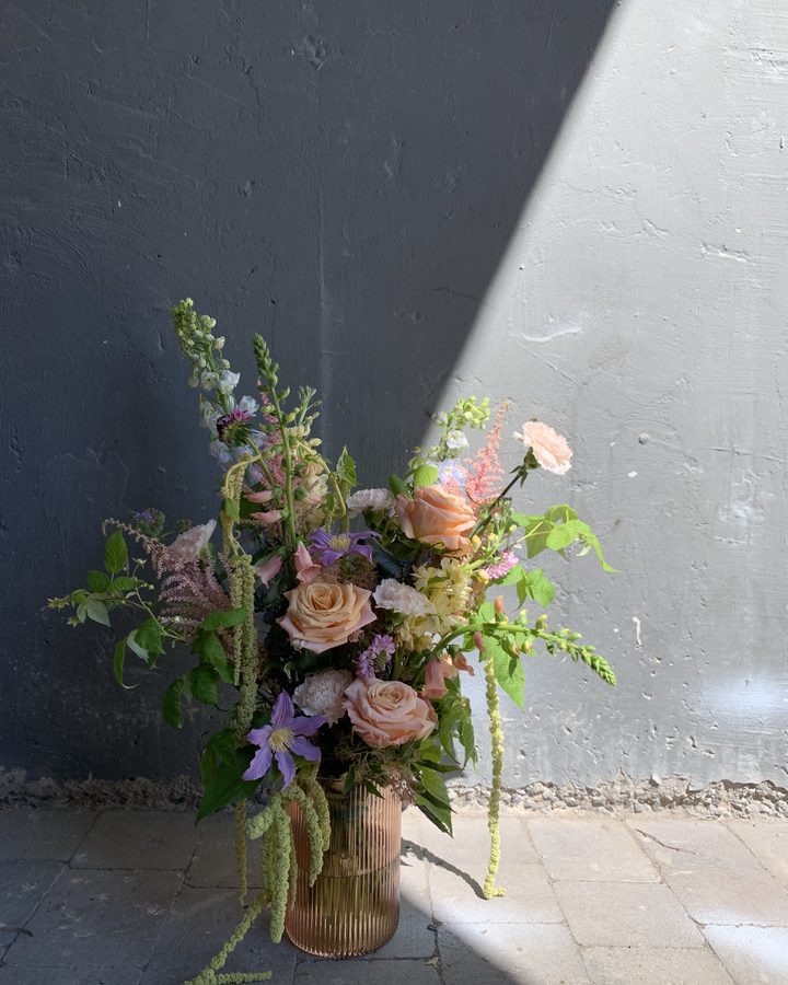 Hand-tied arrangement in progress